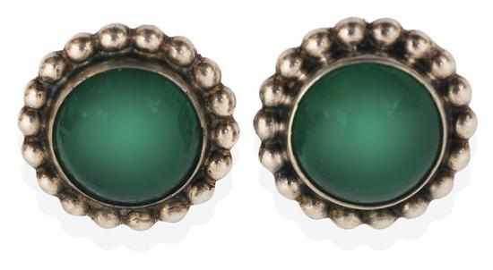 Appraisal: A PAIR OF EARRINGS BY GEORG JENSEN Centrally set with