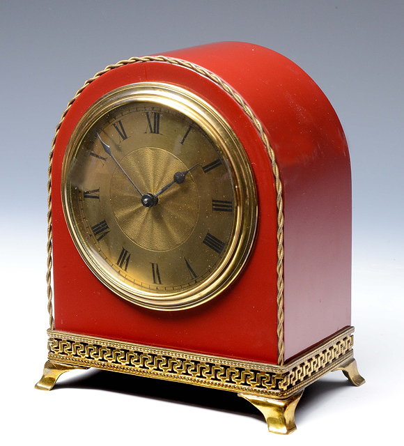 Appraisal: AN EDWARDIAN MANTEL TIMEPIECE the gilt Roman dial with engine