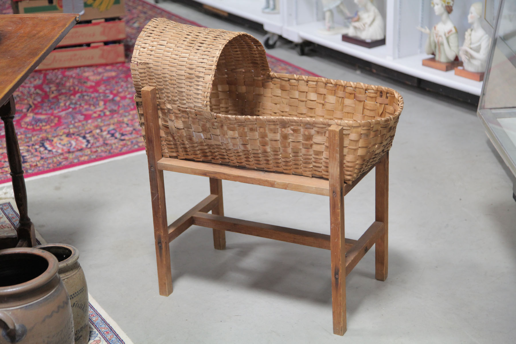 Appraisal: WOVEN CRADLE AND STAND American early th century A purportedly