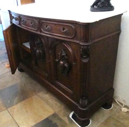 Appraisal: th Century Victorian walnut cabinet sideboard with white marble top