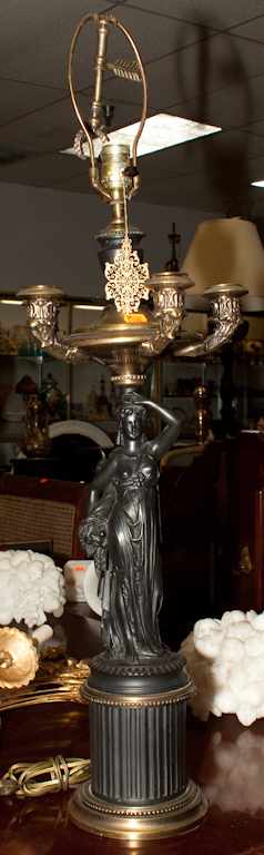 Appraisal: French Empire style painted metal figural lamp Estimate - All