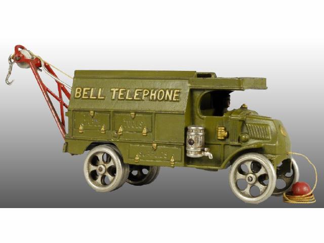 Appraisal: Cast Iron Mack Bell Telephone Truck Toy Description Olive green