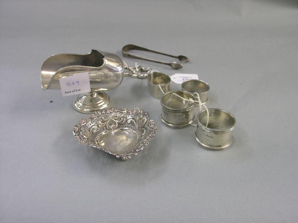 Appraisal: A pair of silver napkin rings two further silver napkin