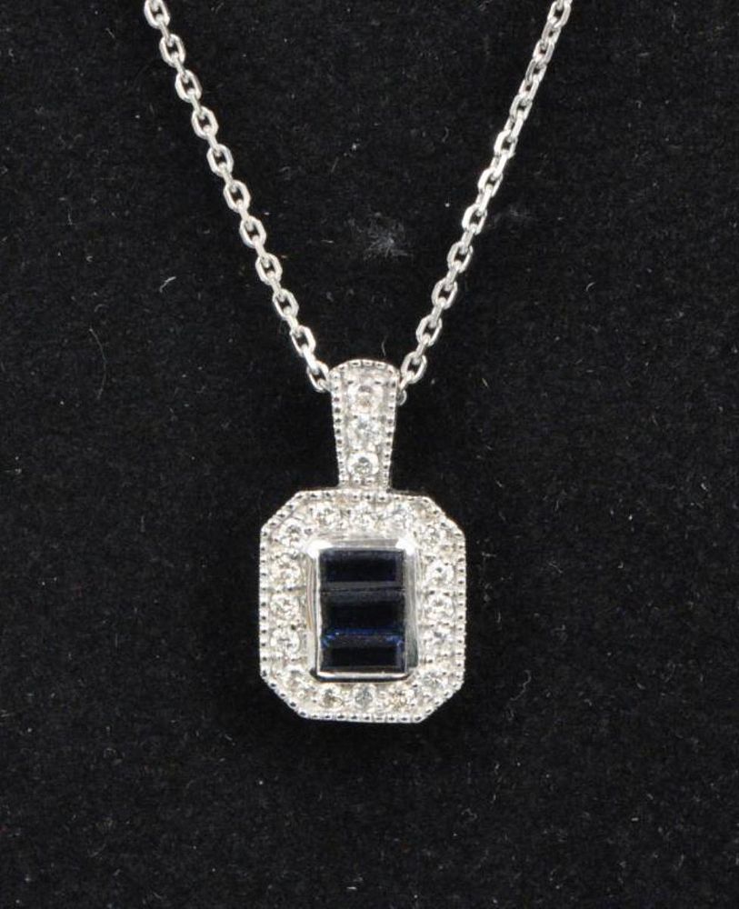 Appraisal: Ladies' Gold Diamond Sapphire Pendant the center set with three