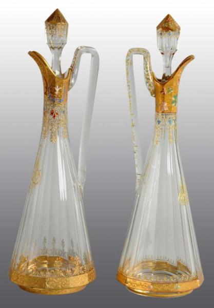 Appraisal: Pair of Hand-Blown Austrian Cut Glass Cruets Description Heavy gold