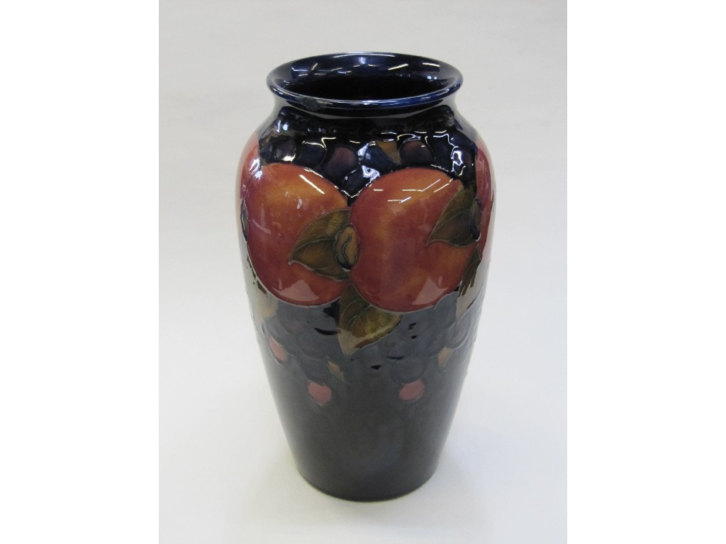 Appraisal: Moorcroft 'Pomegranate' pattern vase on dark blue ground slight rim