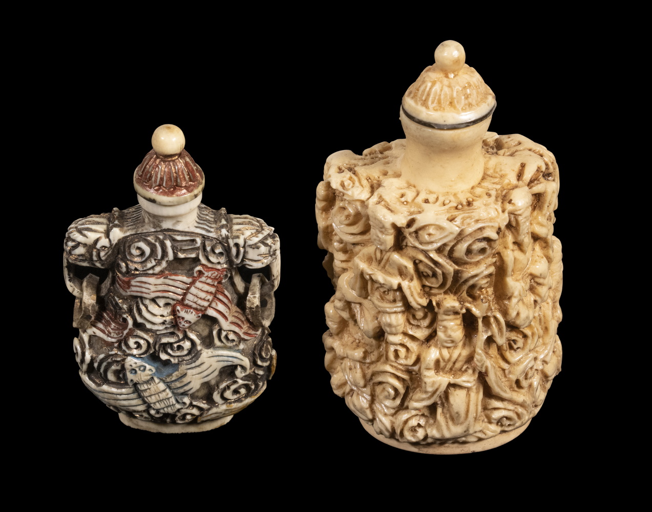 Appraisal: CHINESE RELIEF CARVED SNUFF BOTTLES The smaller in flattened double