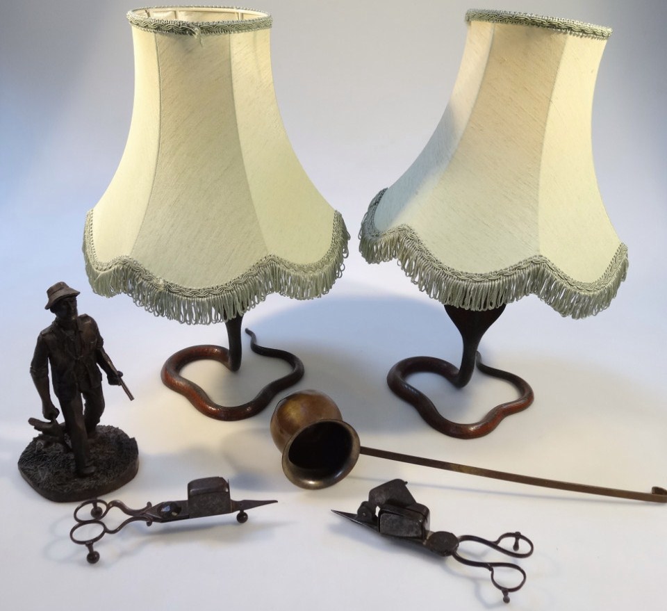 Appraisal: thC metalware comprising a pair of serpent lamps a copper