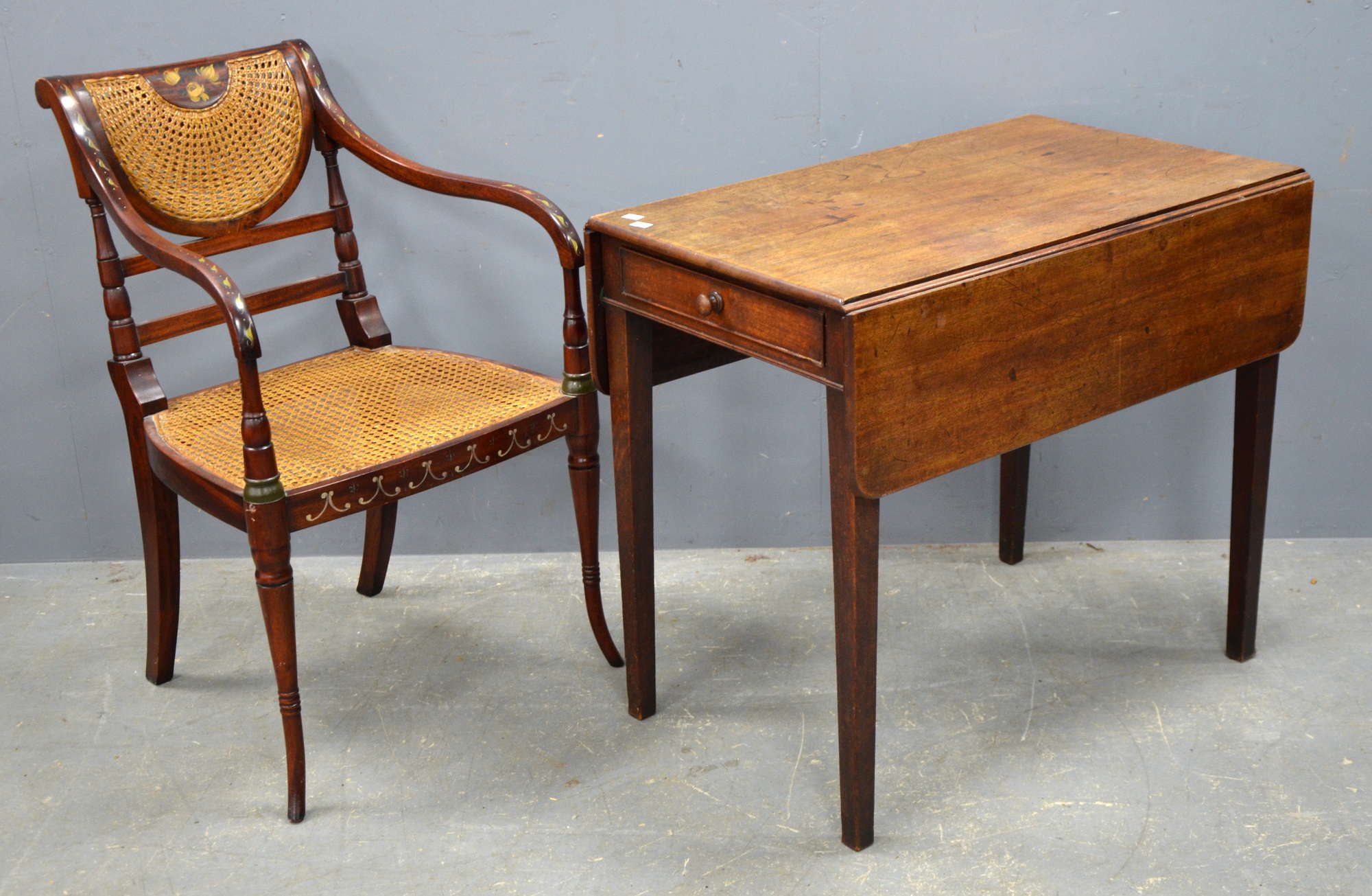 Appraisal: Mahogany Pembroke table and mahogany and caned Regency style chair