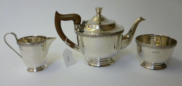 Appraisal: A THREE PIECE TEA SERVICE maker Viners Sheffield of plain