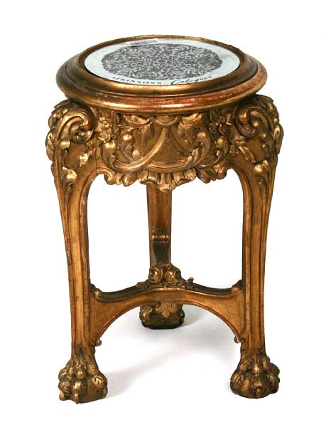 Appraisal: An English carved and gilt table with later mirror top