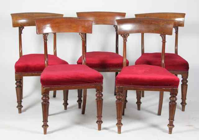 Appraisal: Five Victorian mahogany dining chairs with upholstered seats on carved