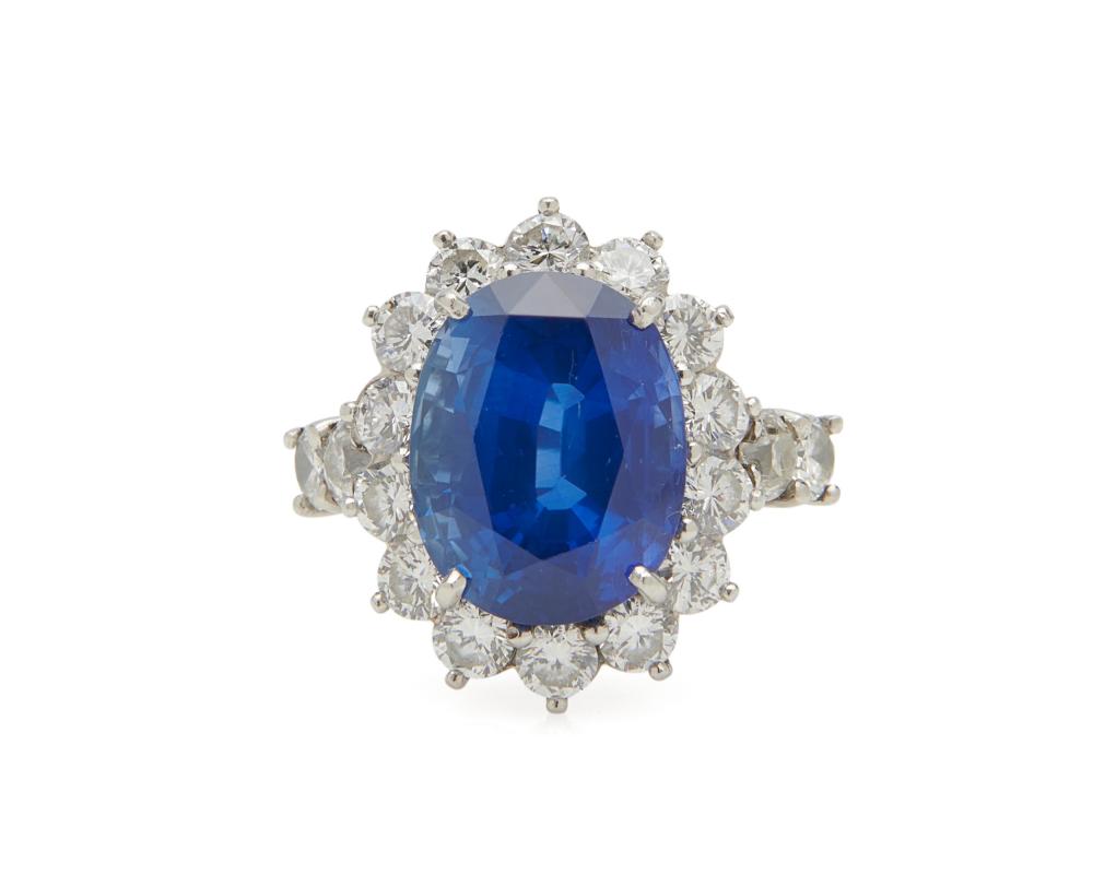 Appraisal: Platinum Sapphire and Diamond Ring centering an oval-cut sapphire weighing