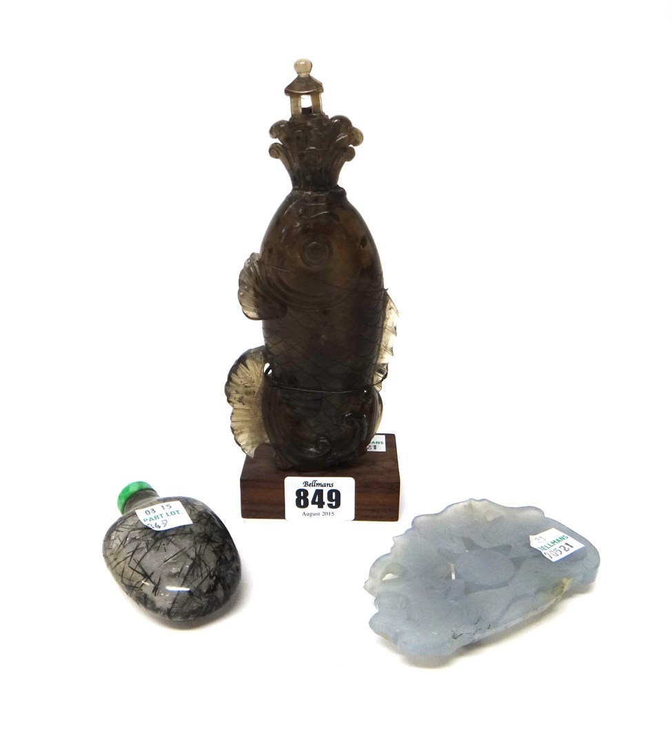 Appraisal: A Chinese smokey brown quartz bottle and stopper probably th