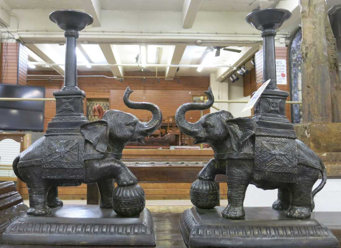 Appraisal: A PAIR OF BRONZE ELEPHANT PRICKET CANDLESTICKS H