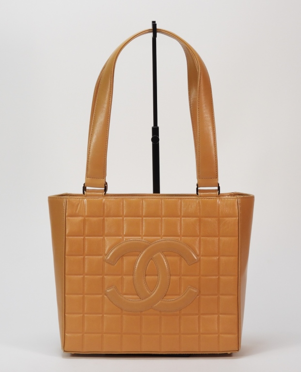 Appraisal: CHANEL TAN LEATHER SQUARE QUILT HANDBAG Camel colored leather bag