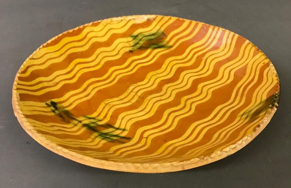 Appraisal: Colorful Slip Decorated Redware Plate Colorful slip decorated redware plate