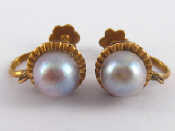 Appraisal: A pair of yellow metal cultured pearl earrings screw fittings