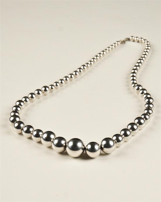 Appraisal: A Graduated Matinee Length Sterling Bead Necklace the beads -