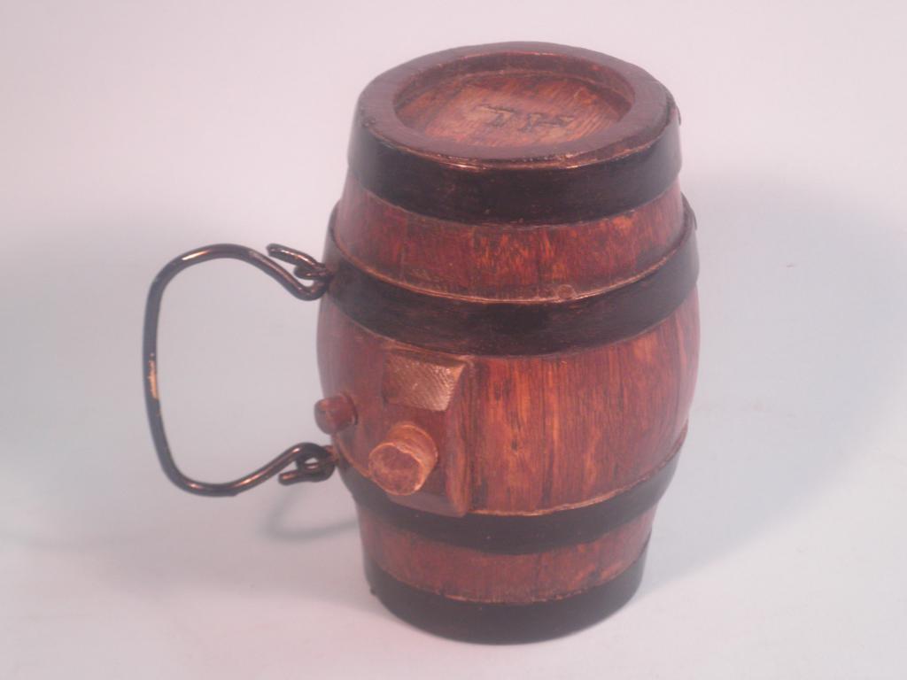 Appraisal: A thC oak small cider costrel type barrel stamped to