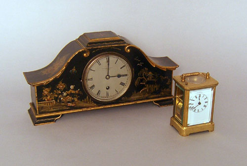 Appraisal: Waterbury carriage clock h together with a japanned mantle clock