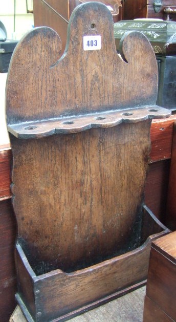 Appraisal: A th century oak spoon rack the shaped back over