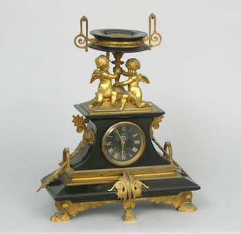 Appraisal: An Empire Period Mantel Clock An ornately fashioned onyx or