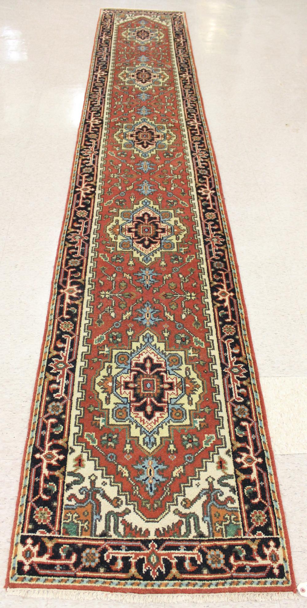 Appraisal: HAND KNOTTED ORIENTAL RUNNER Persian Serab design on salmon ground