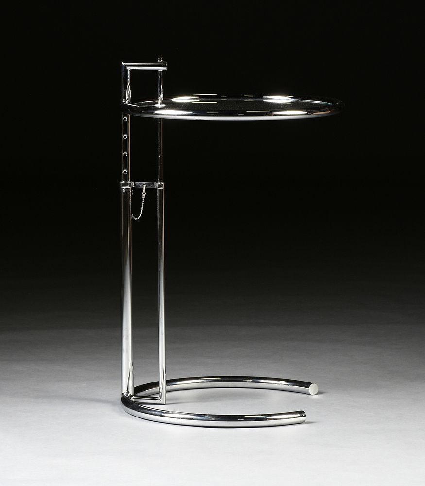 Appraisal: AN EILEEN GRAY ADJUSTABLE GLASS AND CHROME CIRCULAR SIDE TABLE