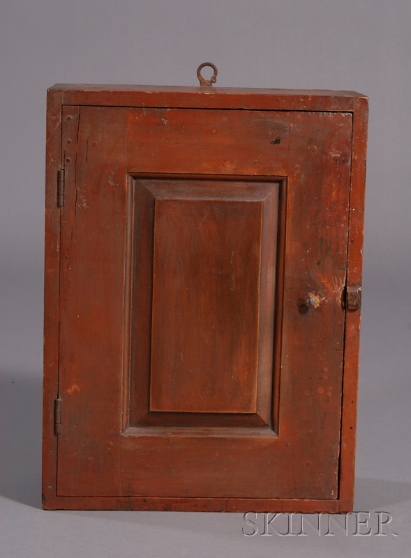 Appraisal: Red-painted Pine Paneled Wall Cupboard probably New England early th