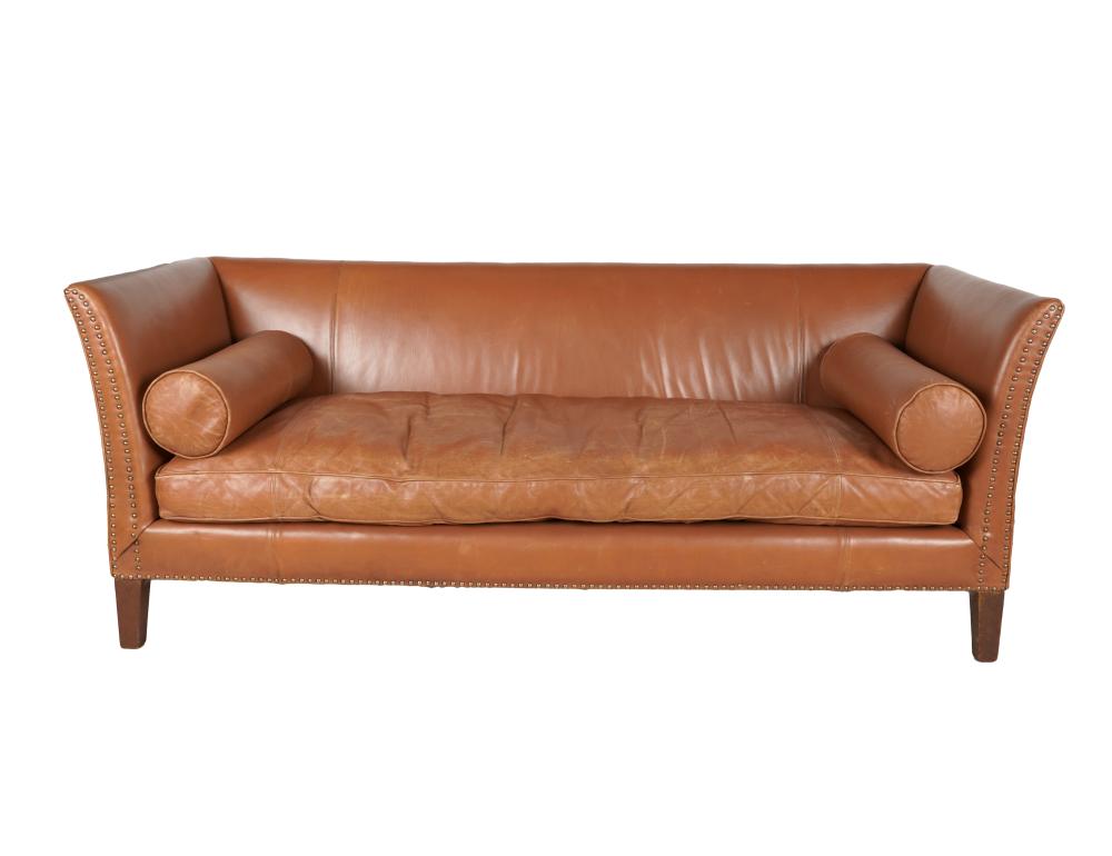 Appraisal: BROWN LEATHER SOFAmanufacturer unknown with nailhead trim and wooden legs