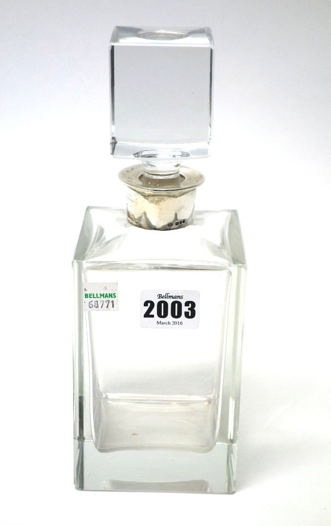 Appraisal: A silver mounted glass decanter of plain rectangular form fitted