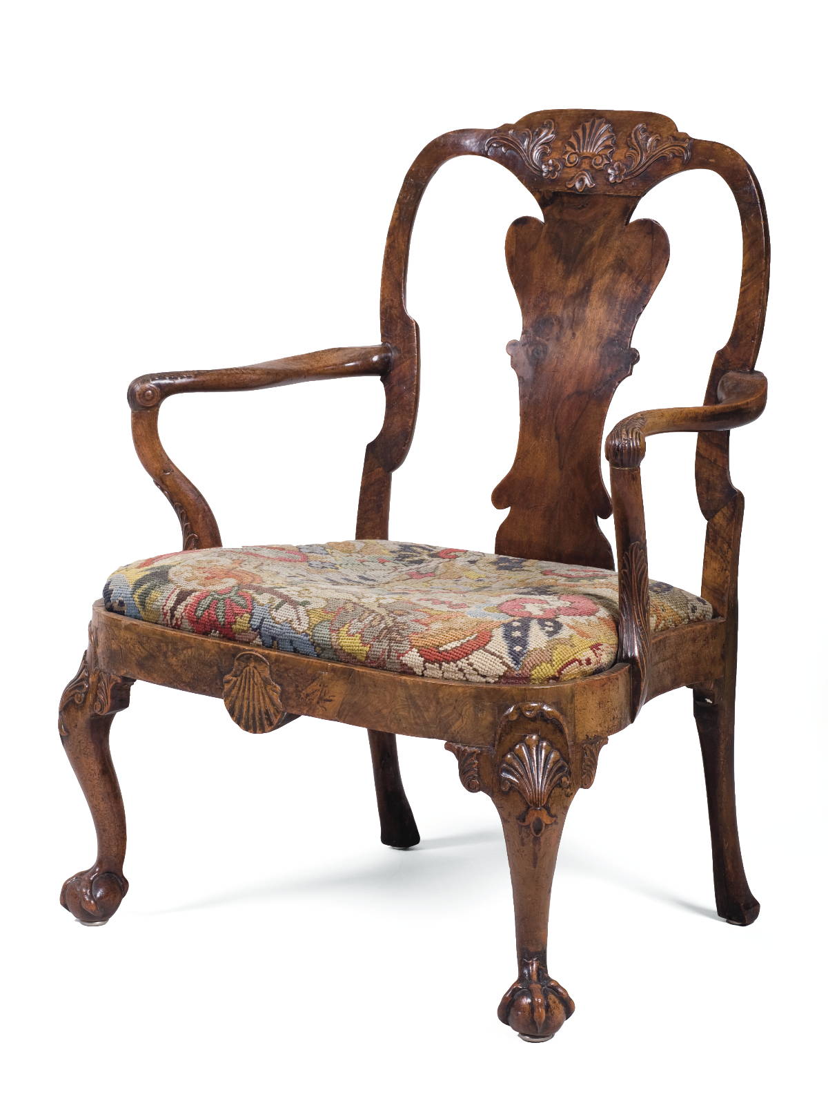 Appraisal: GEORGE II CARVED WALNUT GREAT CHAIR The shaped crest with