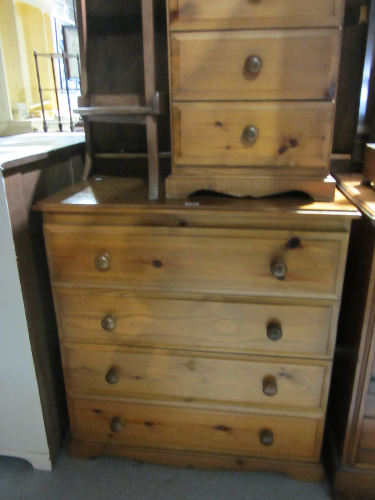 Appraisal: A th century pine chest of four long drawers together