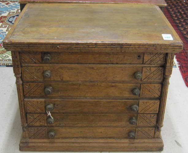 Appraisal: LATE VICTORIAN OAK SPOOL CHEST American late th century fitted