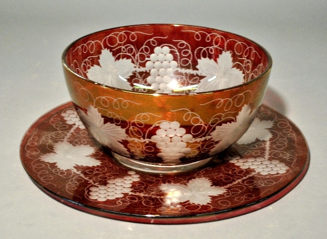 Appraisal: - Red-cut-to-clear glass punch bowl with grape and vine motif