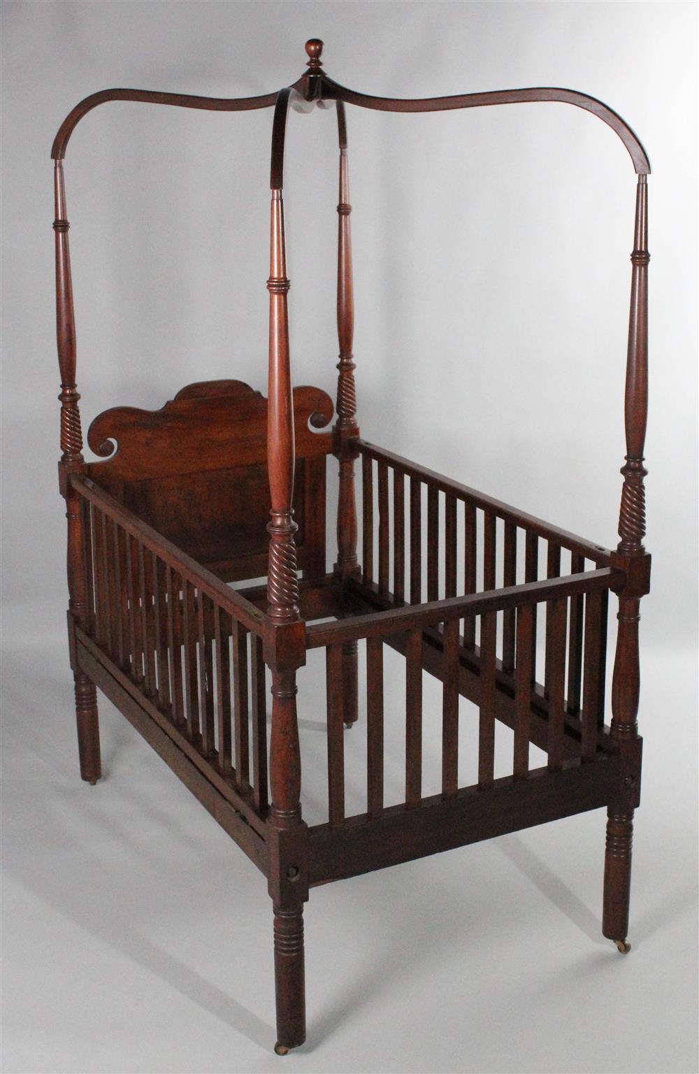 Appraisal: SHERATON MAHOGANY FOUR POST CRIB WITH ARCHED CANOPY early th