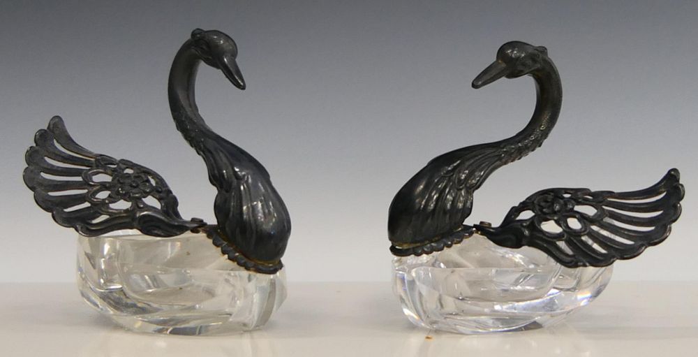 Appraisal: Pr CONTINENTAL SILVERPLATE GLASS SWAN SALT CELLARS A pair of