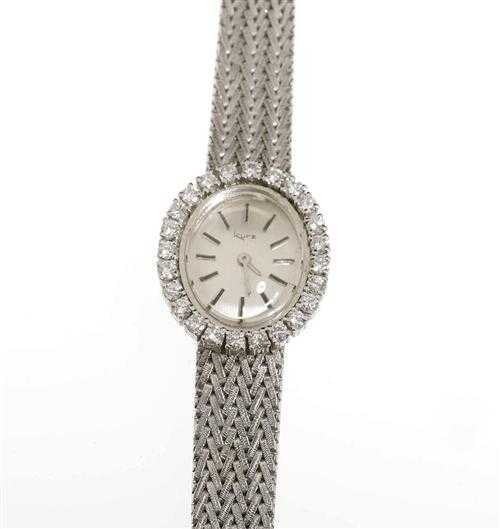 Appraisal: DIAMOND LADY'S WRISTWATCH KURZ s White gold g Oval case