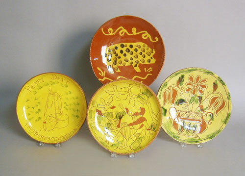 Appraisal: Four Breininger sgraffito redware chargers two are dia other two