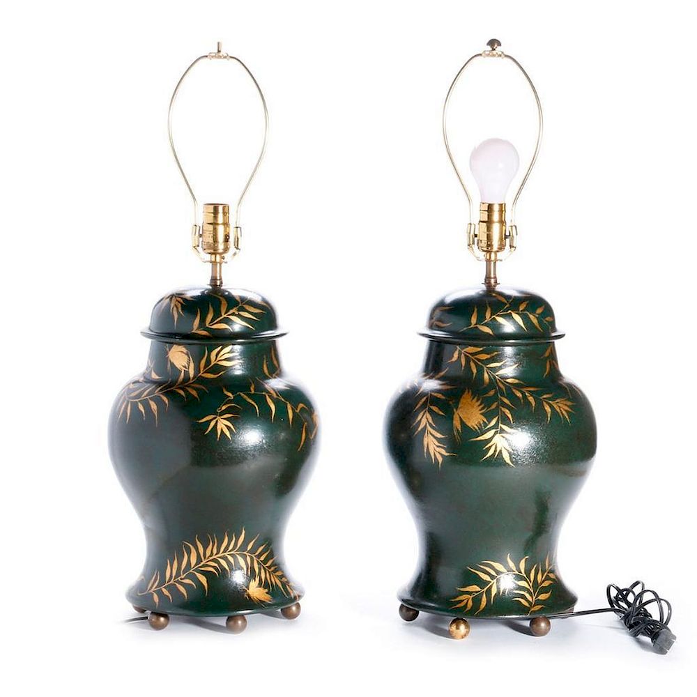 Appraisal: Pair of green and gilt painted lamps A pair of