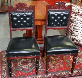 Appraisal: A matched pair of Edwardian stained pine occasional chairs