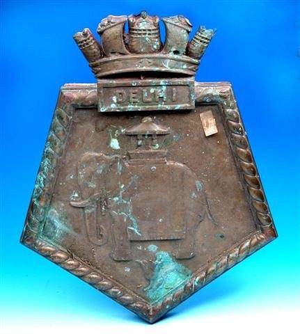 Appraisal: A CAST BRONZE NAVAL PENTAGONAL PLAQUE with coronet above rope