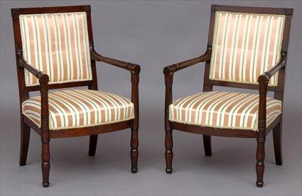 Appraisal: PAIR OF EMPIRE CARVED AND VENEERED MAHOGANY FAUTEUILS Each rectangular