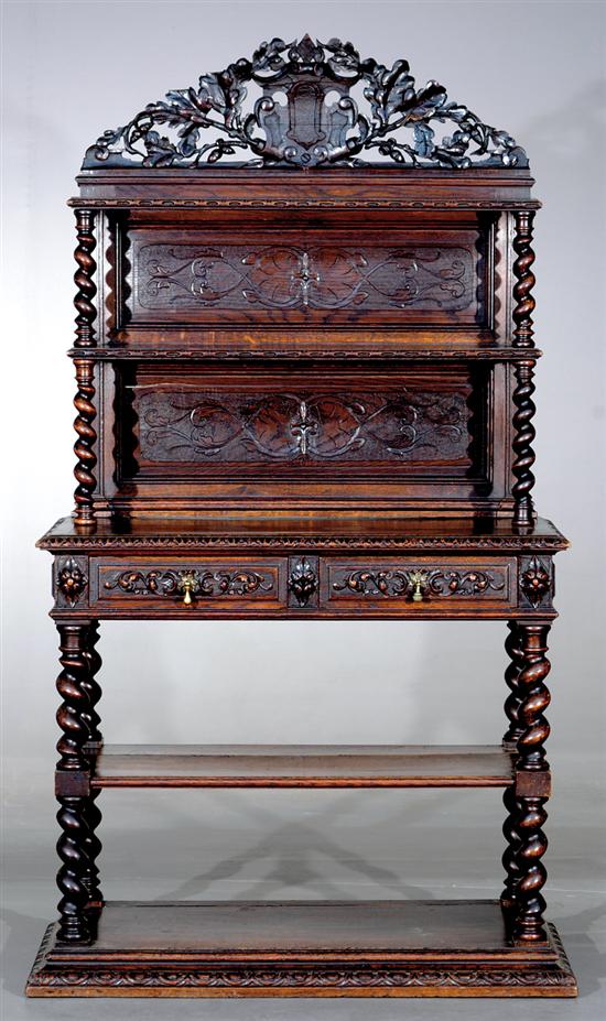 Appraisal: Continental carved oak buffet early th century pierce-carved leaf and