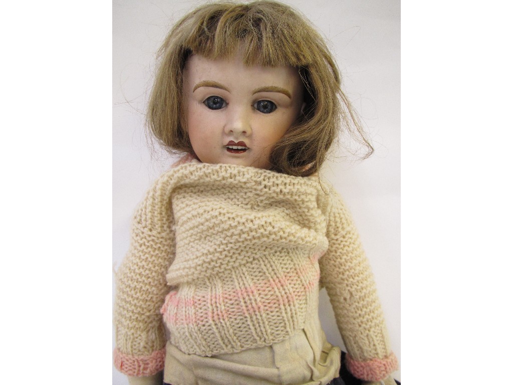 Appraisal: Girl doll with bisque head and composition body