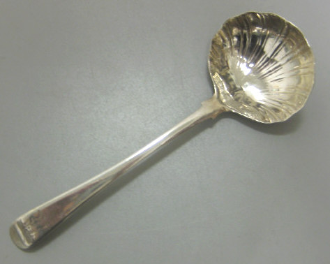 Appraisal: THOMAS DEALTRY LONDON English George III silver sauce ladle shell