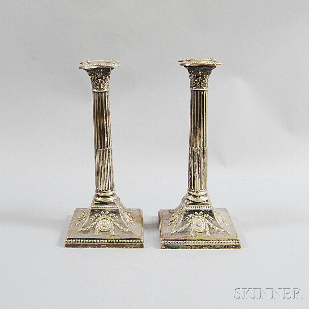 Appraisal: Pair of Georgian-style Silver-plated Candlesticks columnar-form with reeded shafts and