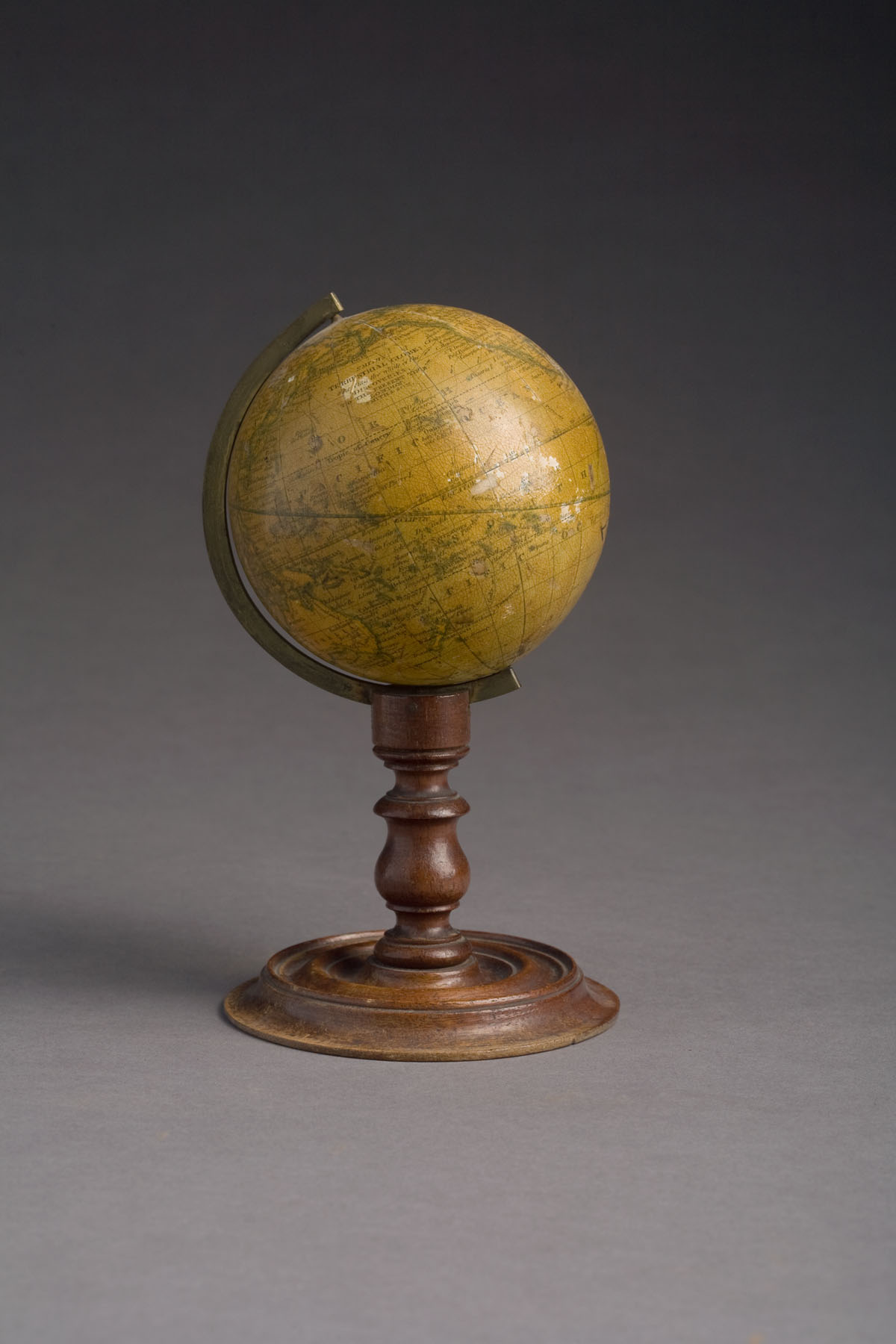 Appraisal: ENGLISH MINIATURE TERRESTIAL GLOBE ON TURNED STAND CIRCA Marked quot