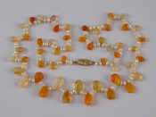 Appraisal: A cultured pearl fire opal and citrine necklace with a